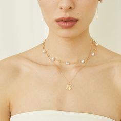 Material: Akoya pearl and 18K solid yellow gold Akoya saltwater cultured pearl Necklace Style:Small Style: 8 pears around 7.0-7.5 mm and 1 pearl on the adjustment chain around 3.5-4.0 mmLarge Style: 12 pearls around 6.5-7.0 mmAlternate Style: 5 pearls around 7.0-7.5mm and 7 pearls around 5.0-5.5 mm The necklaces of large and small styles are mainly about 7.0-7.5 pearls, and there is only a difference in quantity. The Alternate Style is a necklace with large and small pearls. Please keep an eye o Gold Akoya Pearl Beaded Necklace With Pearl Chain, Refined Akoya Pearl Necklace In Yellow Gold, Elegant Adjustable Gold-plated Pearl Necklace, Gold-plated Pearl Necklace With Yellow Gold Pearl Charm, Elegant 14k Gold-filled Pearl Necklace With Charm, Clean Origin, Silver Water, Star Trails, Saltwater Pearls