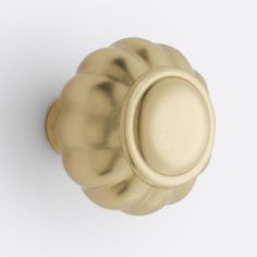 an antique brass door knob on a white background