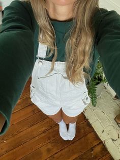 Short Overalls With Long Sleeve Shirt, Cute Overall Shorts, Senior Year Fits, How To Style White Overalls, Preppy Overalls Outfit, White Shortalls Outfit, White Overall Shorts Outfit, White Short Overalls Outfit, Outfits With Overalls Shorts