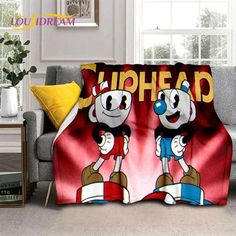 two cartoon characters on a red and yellow background with the words uphead printed on it