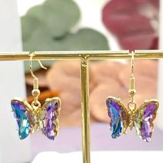 Beautiful Pair Of Butterfly Earrings Like The Butterfly In Flight Dangle One And A Half Inch These Are Amethyst And Sky Blue Topaz. Purple Dangle Jewelry With Butterfly Charm, Purple Pierced Crystal Earrings As Gift, Purple Butterfly Earrings For Gift, Purple Butterfly Charm Jewelry For Party, Purple Butterfly Charm Earrings For Gift, Purple Gemstone Party Earrings, Elegant Purple Butterfly Earrings, Butterfly In Flight, Butterfly Dangle Earrings