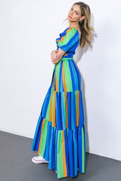 Indulge in the allure of our printed woven maxi dress. Adorn yourself in its square neckline, short puff sleeves, smocked bodice, self sash tie, and tiered skirt. Elevate your wardrobe with this sophisticated and exclusive piece.Details:Self : 100% CottonSize & Fit- Model is 5`8" And Wearing Size Small- Measurements Taken From Size Small- Approx. Length: 59" About Us: Welcome to Lizzie's! We hope you find unique pieces you'll love for years! We've been in the fashion business since 2016. You'll Holiday Tops, The Vibe, Square Necklines, Tiered Skirt, Holiday Dresses, Business Fashion, Square Neckline, Sequin Dress, Puff Sleeves