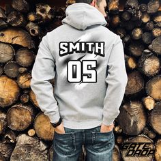 🏁Looking for a gift that revs up the excitement? Look no further. Our Custom Name and Number Motocross Hoodie is the perfect present for birthdays, holidays, or any occasion. This premium hoodie boasts a back print with your favorite rider's name and number. Embrace the spirit of motocross with a hoodie that speaks volumes about your passion. SPECIFICATIONS: Made using 100% ethically grown US cotton. Gildan is also a proud member of the US Cotton Trust Protocol ensuring ethical and sustainable Fan Merchandise Hoodie With Team Name, Crew Neck Hoodie For Sports Season Outdoor Activities, Sporty Hoodie With Letter Print For Outdoors, Team Name Fleece Hoodie For Streetwear, Fleece Hoodie With Team Name For Streetwear, Winter Sports Event Hoodie With Branding, Branded Hoodie For Sports Events In Winter, Branded Winter Hoodie For Sports Events, Winter Hoodie With Branding For Sports Events