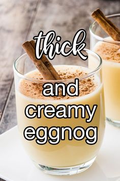 two glasses of eggnog with cinnamon sticks in them on a white plate and the words thick and creamy eggnog