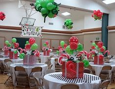 an image of christmas party decorations on pinterest for the holiday season, including balloons and candy canes