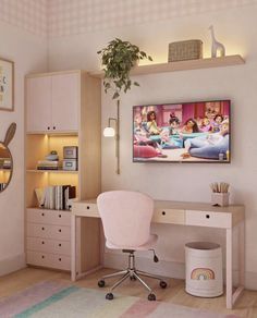 a room with a desk, chair and television on the wall