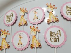 giraffe cupcake toppers with gold foil lettering on pink and white stickers