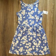 Nwt Periwinkle Blue With White Daisies Scattered Across Carter’s Kids Swing Dress. Slip-Over Head 28” Long (Skirt 16” Long) And Seam Gathered At 13” Waist. One Inch Wide Straps. Sleeveless. Size Carter’s Girl 12/ 12a. 100% Cotton. Perfect For Spring Cute Blue Floral Print Sundress, Cute Blue Floral Sundress, S Girl, Flutter Dress, White Daisies, Dress Slip, Carters Girl, Stripped Dress, Corduroy Dress