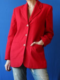 Vintage red simple hip length blazer jacket. Long sleeves, darted waist, padded shoulders, two side pockets, full lining. Classic yet exclusive designers cut. Material is polyester. Tag: C&A Size 36, IT 44, UK 10 Fits like size S. Measured laying flat: 28'' / 71 cm long 19'' / 48 cm armpit to armpit 17'' / 43 cm waist 16'' / 41 cm shoulders seam to seam 23'' / 59 cm sleeve length Great vintage condition. Red Long Sleeve Blazer For Business Casual, Chic Red Blazer For Business Casual, Red Single-breasted Blazer For Business Casual, Red Single Breasted Blazer For Business Casual, Tailored Red Career Blazer, Tailored Red Blazer For Career, Red Tailored Blazer For Career, Red Office Blazer With Pockets, Classic Red Blazer For Business Casual