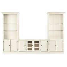 a white entertainment center with glass doors and cupboards on the front, side by side