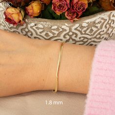 Our 14K Gold Snake Chain Bracelet is the epitome of sleek design and modern luxury. This handcrafted piece, with its distinctive flat snake chain, offers a smooth and comfortable fit, making it perfect for daily wear or special occasions. The high-quality 14K gold construction not only imparts lasting durability but also an undeniably elegant aesthetic. Available in various widths and lengths, this bracelet can be personalized to your exact preference for a snug or more relaxed fit. Key Features Flat Snake Chain, Gold Snake Chain, Elegant Aesthetic, Snake Chain Bracelets, Gold Flats, Gold Snake, Classic Gold, Exquisite Jewelry, Snake Chain