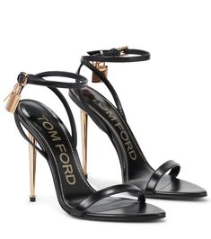 Featuring lock charms at the ankle fastenings that complete the narrow metal stiletto heels, the aptly-named Padlock sandals from Tom Ford will imbue cocktail-ready looks with a tough-luxe twist. Made from leather, the pair is open-toed and secures with classic buckle fastenings. | Tom Ford Padlock leather sandals Tom Ford Heels, Tom Ford Shoes, Black Toms, Heels Classy, Ankle Straps, Designer Heels, Heeled Sandals, Luxury Shoes, Black Heels