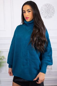 This super cozy sweater is a must have to keep you warm while also stylish Mid weight Cable Knit Loose Fit Balloon Sleeves Chunky turtleneck Long sleeves stunning detail fabric Fits true to size Model is wearing a size small Total body length: 26” chest 50 approximately. 100% Acrylic Trendy Oversized Soft Knit Turtleneck, Trendy Oversized Knit Turtleneck, Oversized Soft Knit Long Sleeve Turtleneck, Snug Soft Knit Turtleneck Top, Chunky Knit Long Sleeve Turtleneck For Layering, Trendy Chunky Knit Long Sleeve Turtleneck, Winter Cable Knit Long Sleeve Turtleneck, Cozy High Neck Turtleneck, Cozy High-neck Sweater