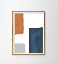 an abstract painting with blue, orange and grey colors in a wooden frame on the wall