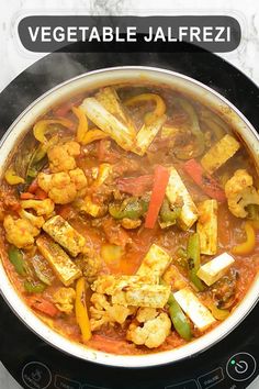 a pot filled with food sitting on top of a stove