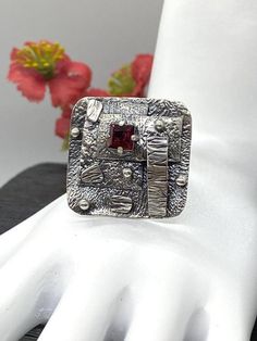 Artisan Art Deco style gemstone ring - FINAL SALE Hand-made Sterling Silver 925 size 9-9 1/2 Stones used: Garnet Face of the ring: Height - 27mm, Width-28mm Band height - 5mm Unique Handcrafted One-of a-kind Design Ring Each Piece of Jewelry in my Collection is Absolutely One of a Kind! When you start wearing a piece of my jewelry you will fall in love with it more and more each day and feel that good Energy and Love that I pass into it while creating this piece of Art. A piece of Art created fo Artisan Sterling Silver Ring With Unique Design, Handmade Adjustable Brutalist Jewelry, Adjustable Brutalist Jewelry Gift, Sterling Silver Modernist Rings For Gifts, Modernist Ring Jewelry As Gift, Unique Silver Ruby Ring With Stone Setting, Unique Ruby Ring In Sterling Silver, Unique Silver Ruby Ring Gift, Handmade Silver Brutalist Rings