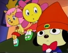 the cartoon character is wearing a red hat and sitting on top of a table with other characters