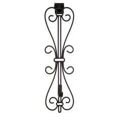 an iron wall mounted candle holder