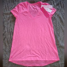 Lilly Pulitzer Etta Top Prosecco Pink Xxs V-Neck. Color This Intense Is Extremely Sensitive To Fading. Although It Will Retain It's Lilly-Ness Forever, The Depth Of Color Will Fade In Direct Sunlight After 10- 20 Hours Of Exposure. Pink V-neck Workout Tops, Lilly Pulitzer, Tops & Tees, Womens Tops, V Neck, Pink, Women Shopping, How To Wear, Color