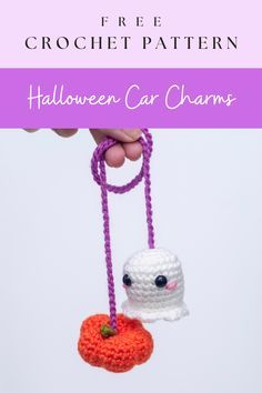 a crocheted halloween car charm hanging from a purple cord with the words free crochet pattern on it