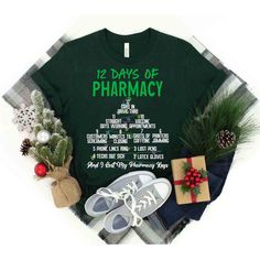 a green shirt with the words 12 days of pharmacy next to christmas decorations and presents