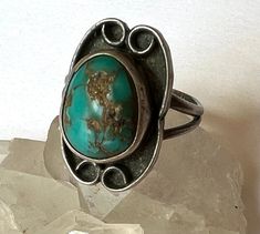 Vintage Untreated Oval Emerald Ring, Vintage Oval Untreated Emerald Ring, Adjustable Oval Turquoise Ring With Patina, Vintage Oval Natural Emerald Ring, Antique Turquoise Ring With Patina For Gift, Handmade Adjustable Vintage Turquoise Ring, Antique Turquoise Ring With Patina, Vintage Handmade Oval Turquoise Ring, Bohemian Turquoise Ring With Patina For Collectors