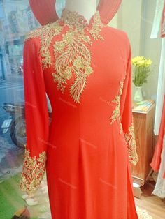 Ao Dai are made to measure and made to order. - The average sewing and shipping time is 4-6 weeks. However, if you need the Ao Dai sooner, you can contact us so we can expedite the delivery for you. - All Ao Dai are made from high quality materials and include pants. - The Khan Vanh is an accessory and you can order it separately, or customize the color and use the same lace fabric as on the dress to add to the Khan Vanh for uniformity. - We also make custom Ao Dai upon request. If you like any other Ao Dai that is not in the store, please send us a picture and we will quote you a price. - Because the shipping cost is quite high and the dress is made to your own measurements, we only accept returns in the event of damage during shipping. We will not accept returns for reasons of not liking Floor-length Dress With Intricate Design For Festive Occasions, Festive Floor-length Dress With Intricate Design, Elegant Gold Wedding Dress For Festive Occasions, Traditional Ao Dai With Intricate Embroidery For Wedding, Fitted Gold Wedding Dress For Festive Occasion, Traditional Red Gown For Marriage, Elegant Gold Wedding Dress With Zari Work, Traditional Red Marriage Dress, Traditional Red Dress For Marriage