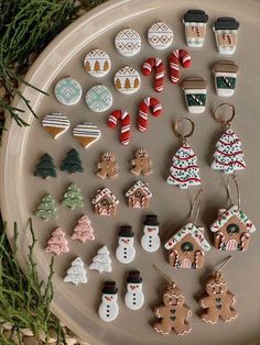 christmas cookies and ornaments are arranged on a platter