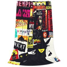 a black and white scarf with many different types of books printed on the front, along with other items