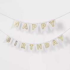 happy birthday bunting banner with gold foil letters on light blue background, set of 2