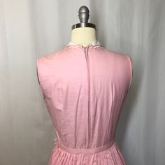 "Unworn without tags. Sleeveless pint with lace and pleated tuxedo front detailing. Back of belt reads Leslie Washable Tagged size 11. In as found condition - not laundered. Shown on size six dress form Measurements Bust: 35\" Waist: 26\" Hip: Open Back of neck to waist: 15\" Will ship internationally - please convo for pricing. PLEASE convo me if you have any further questions about this item or would like to see more pictures. I do my best to research items thoroughly before listing as well as Fitted Sleeveless Dress With Lace Collar, Feminine Sleeveless Dress With Lace Collar, Sleeveless Dress With Lace Collar For Daywear, Pink Fitted Pleated Sleeveless Dress, Pink Fitted Sleeveless Pleated Dress, Pink Pleated Sleeveless Fitted Dress, Spring Sleeveless Dress With Lace Collar, Vintage Sleeveless Dress With Lace Collar, Vintage Sleeveless Dress With Lace Trim