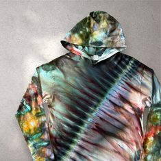 Tie Dye Long Sleeve Hood Unisex Medium Cotton Shirt, Ready to Ship This Dharma Hoodie is soft ringspun 100% cotton jersey - feels like a heavy weight t shirt.  Very comfy feel with double needle hemmed sleeves, hood, and hem.  Ice dyed with lots of "street art" vibe - this pattern is tied, but also has lots of speckles that look sprayed on.  All the fall colors - green/gray/brown/rust/gold. The hood adds to the street vibe, and this is a nice mid to heavy weight cotton that is great to wear alon Cotton Hooded T-shirt For Fall, Hooded Cotton T-shirt For Fall, Oversized Cotton Tie-dye Hoodie, Urban Style Hooded Cotton Tops, Winter Cotton Hooded T-shirt, Unisex Cotton Hoodie With Long Sleeves, Unisex Long Sleeve Cotton Hoodie, Unisex Cotton Long Sleeve Hoodie, Unisex Casual Cotton Hoodie