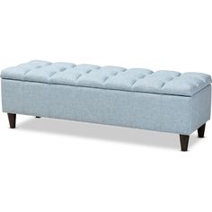 a light blue bench with buttons on the back and legs, in front of a white background