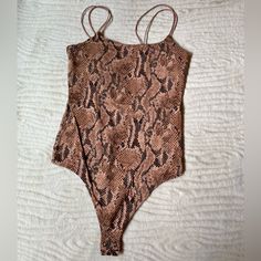 Express Snake Skin Print Bodysuit Very Flattering, Open Back Never Worn Xs Fitted Brown Summer Bodysuit, Fitted Brown Bodysuit For Spring, Trendy Fitted Brown Swimwear, Trendy Brown Summer Bodysuit, Snake Skin Print, Print Bodysuit, Snake Skin, Open Back, Womens Tops