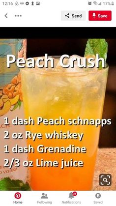 a glass filled with orange liquid next to a box of peach crush