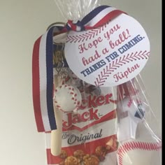 a plastic bag filled with baseballs and other items