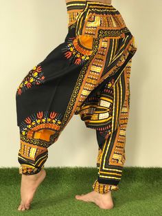 Dashiki Design, Harem Pants ,Handmade pants, Thick Smock Waist Low Crotch,Bohemian Harem cotton pants, African Dashiki Harem, Aladdin harem pants are very roomy, loose fitting and extremely comfortable. Elasticated both at the waist and ankle, with the crotch just below the knee. Bohemian Harem Unisex pants, Aladdin pants, Baggy Pants, Drop Crotch Pants. Dashiki pants, Yoga pants, Boho Hippi pants. *Fabric Type: Best Quality Fabric Cotton 100%. *Elastic Waist and around the ankle. *Quality sewin Multicolor Boho Print Harem Pants, Cotton Hippie Pants With Boho Print, Hippie Style Cotton Pants With Boho Print, Hippie Cotton Pants With Boho Print, Hippie Boho Print Cotton Pants, Casual Cotton Harem Pants With Boho Print, Cotton Boho Print Hippie Bottoms, Cotton Hippie Bottoms With Boho Print, Hippie Cotton Bottoms With Boho Print