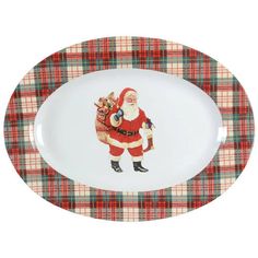 a plate with a santa clause holding a dog on it's back and plaid pattern