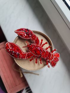 Excited to share the latest addition to my #etsy shop: lobster brooch, ocean jewelry, embroidery art https://www.etsy.com/RdjewelryDesigns/listing/1454730160/lobster-brooch-ocean-jewelry-embroidery?utm_campaign=Share Lobster Embroidery, Beaded Lobster, Embroidered Lobster, Pin Embroidery, Lobster Design, Embroidery Brooch, Cooking Gift, Godfather Gifts, Pearl Embroidery