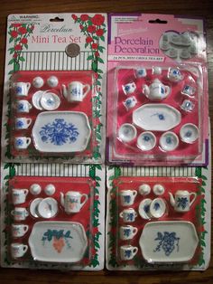 four sets of porcelain tea cups and saucers in plastic packaging on a wooden table