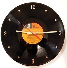 a clock made out of an old record