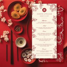 a red and white menu on a table next to some bowls with chopsticks