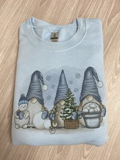 Fleece Unisex Crewneck Sweatshirt with Gnomes design. 50% cotton/50% polyester. Air jet yarn for a soft, pill-resistant finish. Cold wash. Thank you! Christmas Party Shirts, Winter Sweatshirt, Party Shirts, Christmas Party, Crew Neck Sweatshirt, Gender Neutral, Christmas Gifts, Crew Neck, Sweatshirts Hoodie