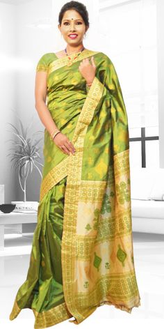 Beautiful Green colour Assam silk Pat saree  with artistic Guna  work of round buta giving an ethnic look to the collecion. The saree is known as VIP because anchal part is stitched seprately with the saree. The Saree comes with 2 matching blouse pcs. one is of body colour and other is of anchal colour, the blouse shown in the image is just for display purpose.Slight colour variation may be there in display & actual. Mekhala Chadar, Mekhla Chadar, Indian Silk Sarees, Lifestyle Clothing, Green Colour