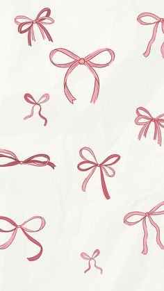 pink bows and ribbons on white paper