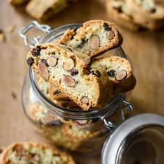 chocolate chip cookies in a glass jar on a wooden table