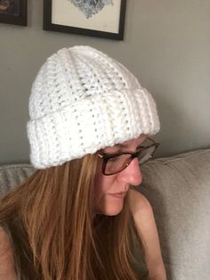 Stay warm and stylish this winter with this beautifully handcrafted white crocheted toque. Made from 100% acrylic yarn, this hat offers a soft, comfortable fit while providing excellent warmth and durability. The natural white colour makes it the perfect accessory to complement any outfit, whether you're dressing up for a winter outing or bundling up for outdoor activities. - **Material 100% acrylic, hypoallergenic and gentle on sensitive skin. - **Design Handmade with care, featuring a classic Skin Design, Winter Essentials, Winter Hat, Acrylic Yarn, Plein Air, Stay Warm, Snug Fit, Caps Hats, Accessories Hats