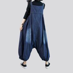 Be the talk of the town with our 2023 Spring Collection Women's Baggy Jean Jumpsuit street vibe for the trendy trendsetter.Why You'll Love It: Sanded for Style and Comfort: Crafted from premium denim with a medium wash. this jumpsuit features a sanded texture for a unique look and feel. Suspenders Closure: Keeping the baggy look intact. the suspenders closure ensures a snug and secure silhouette. Modern Street Style: With a casual silhouette and a touch of modern flair. this jumpsuit is perfect Casual Indigo Denim Jumpsuit, Spring Solid Color Overalls, Spring Relaxed Fit Solid Color Jumpsuits And Rompers, Spring Solid Color Relaxed Fit Jumpsuits And Rompers, Relaxed Fit Solid Color Overalls For Spring, Fall Dark Wash Jumpsuits And Rompers With Pockets, Non-stretch Solid Color Overalls For Spring, Spring Casual Solid Color Overalls, Casual Spring Overalls In Solid Color