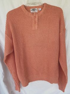 Up for sale is this great VINTAGE MEN'S SWEATER, made in the 1980's by SATURDAYS.  It is BRAND NEW, still has an ORIGINAL TAG and in PERFECT CONDITION. Made of 45% COTTON & 55% RAMIE.  LIGHT PEACH in color.  TWO BUTTON PULLOVER. MEN SIZE EXTRA LARGE.  Measurements:  Shoulders= 25". Armpit seam to armpit seam= 26". Length from center of back collar seam to bottom of sweater= 29". Sleeve= 28". Please feel free to message any questions. Peach Sweater Outfit, Peach Sweater, Sweater Outfits Men, Light Peach, 80s Vintage, Pullover Men, Men's Sweater, Vintage Men, Sweater Outfits