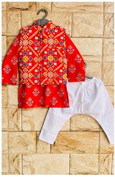 This kurta is crafted from high-quality soft cotton, ensuring maximum comfort for kids in ethnic wear. It's designed to be gentle on the skin and suitable for extended wear. Fabric: 100% Cambric Cotton Set: Kurta Pajama with Jacket/Vest Pattern: Handmade Printed Ideal for: Ethnic occasions, house parties, festivals, weddings, fancy dress, get-togethers, and pujas. Wash & Care Instructions: Hand wash separately Air dry Customer satisfaction is a top priority. Please feel free to contact me with any concerns regarding the product. Kurta Pajama With Jacket, Kids Kurta Pajama, Patola Print, Kids Kurta, House Parties, Boys Kurta, Kurta Pyjama, Kurta Pajama, Nehru Jackets